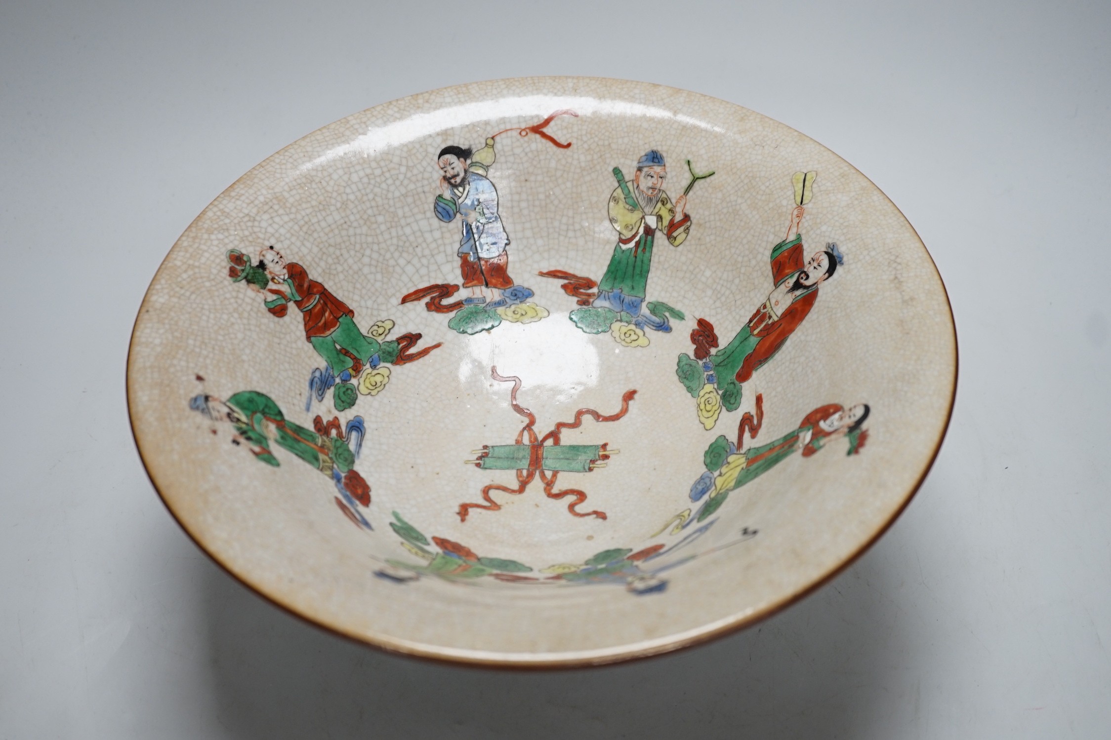 A Chinese famille verte crackle glaze ‘Eight Immortals’ bowl, early 20th century, 29cm diameter, on hardwood stand